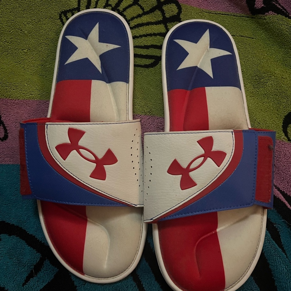 Size 13 men’s UA Texas slides